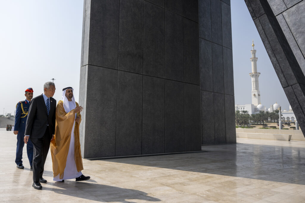 Theyab bin Mohamed bin Zayed receives Singapore Prime Minister Lee Hsien Loong at Wahat Al Karama